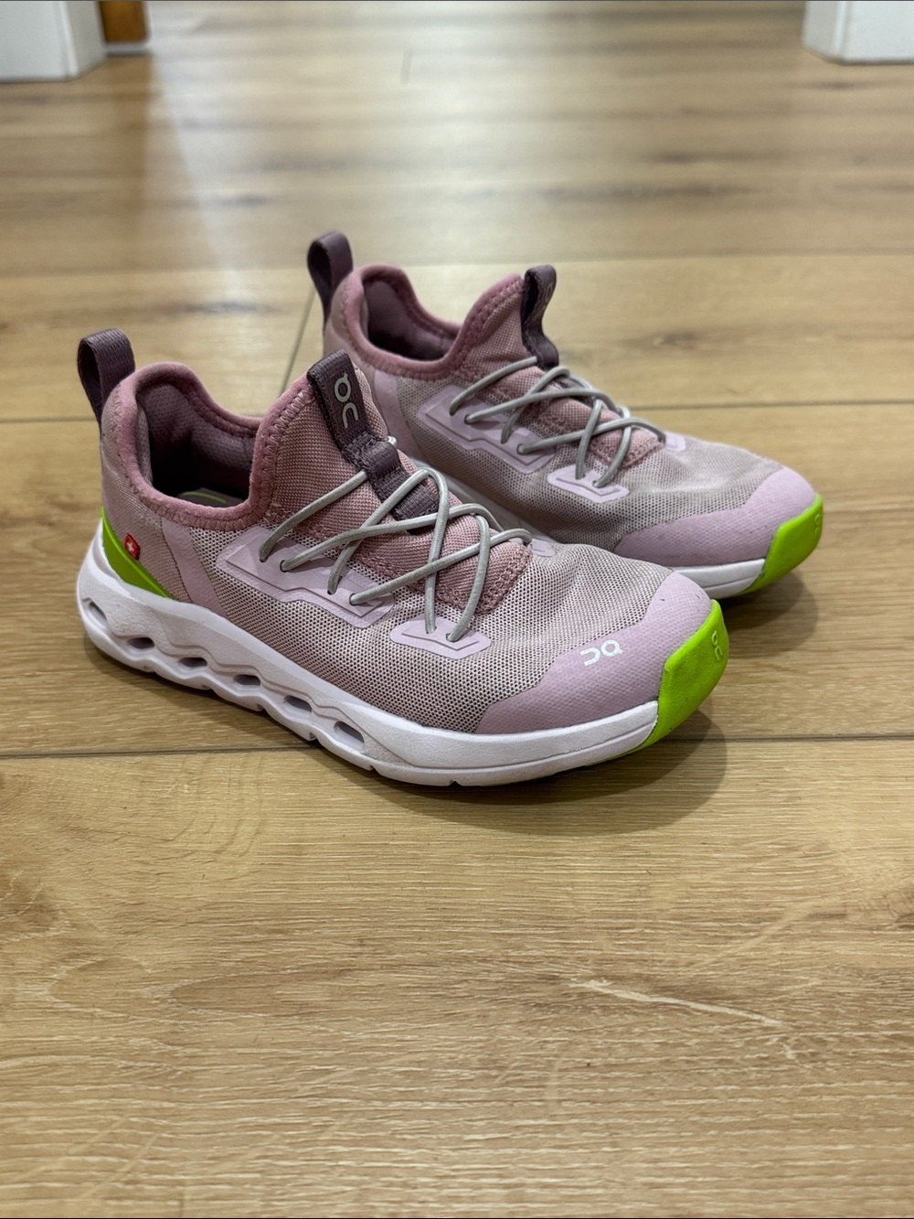 On Running Pink Sneakers with Lime Toe Accents